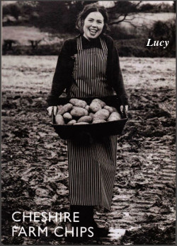 Lucy carrying a large basket of potatoes